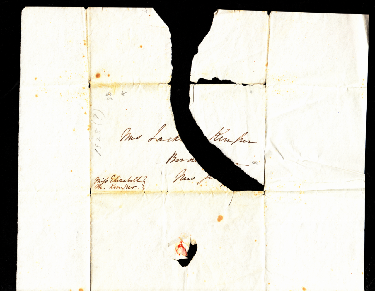 Photo of a decaying and torn letter